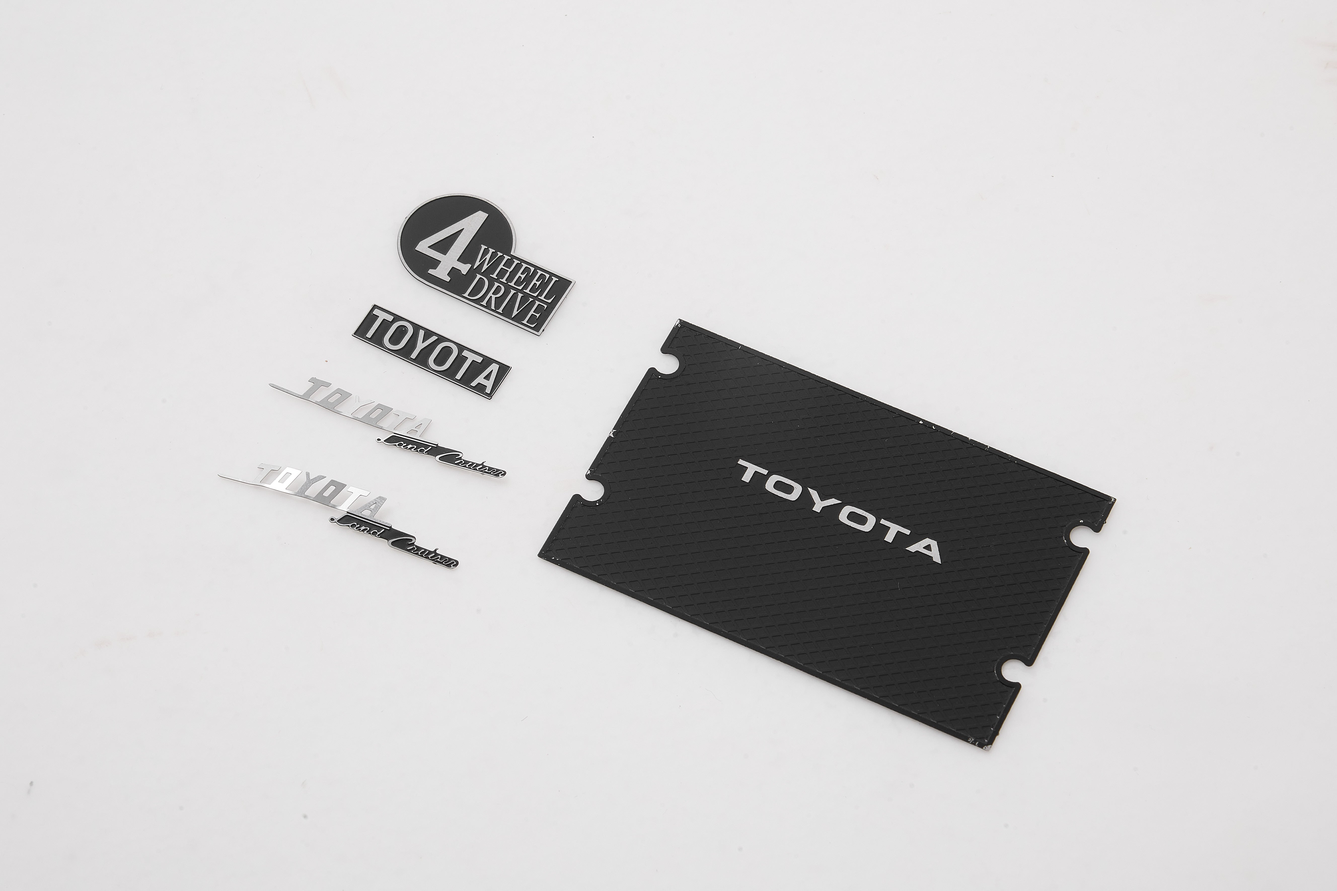 Toyota FJ40 nameplate and logo set including 4 Wheel Drive badge.