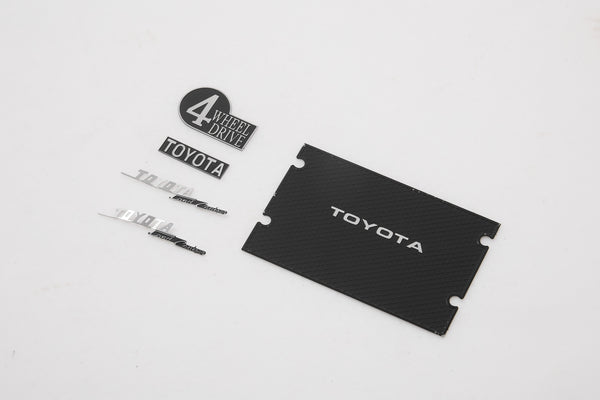 Toyota FJ40 nameplate and logo set including 4 Wheel Drive badge.